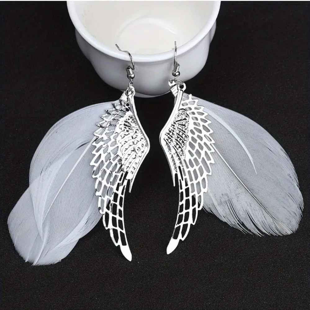 Hollow Angel's Wing Design With White‎ Feather Dangle Earrings 2/$15 3/$20